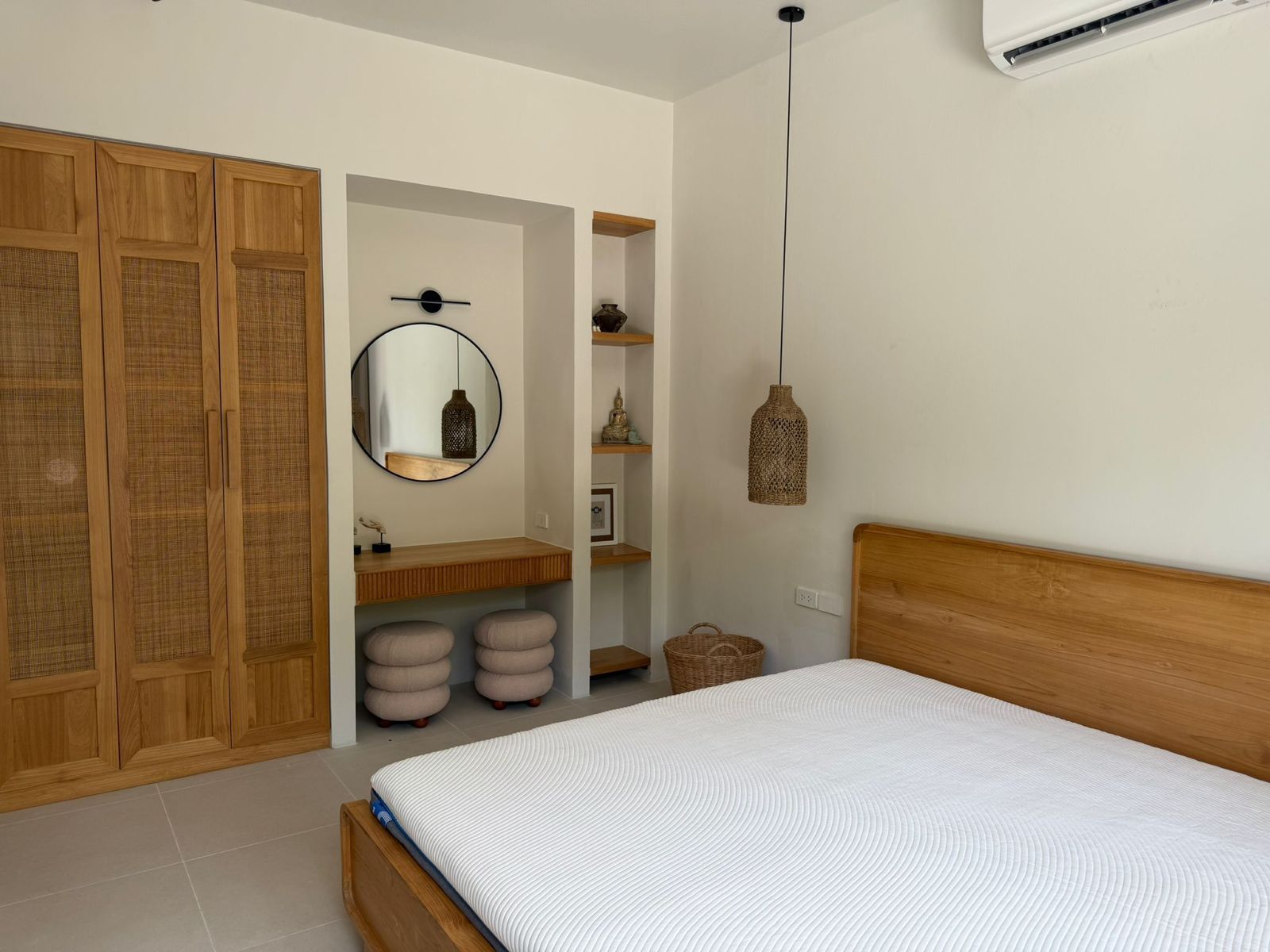 Bedroom listing photo before and after enhancement, shown as a draggable before/after comparison - before